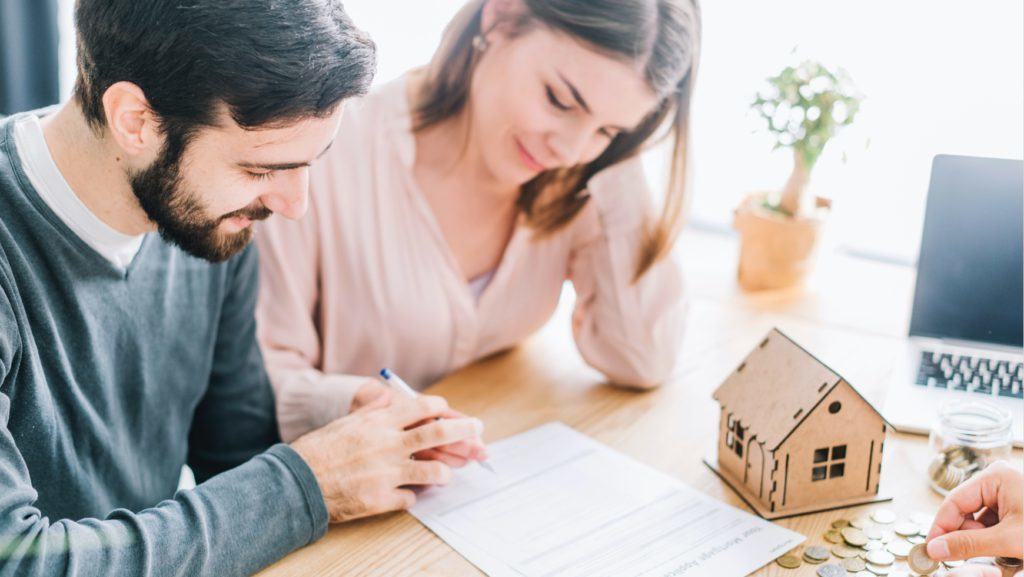 young couple reviewing document